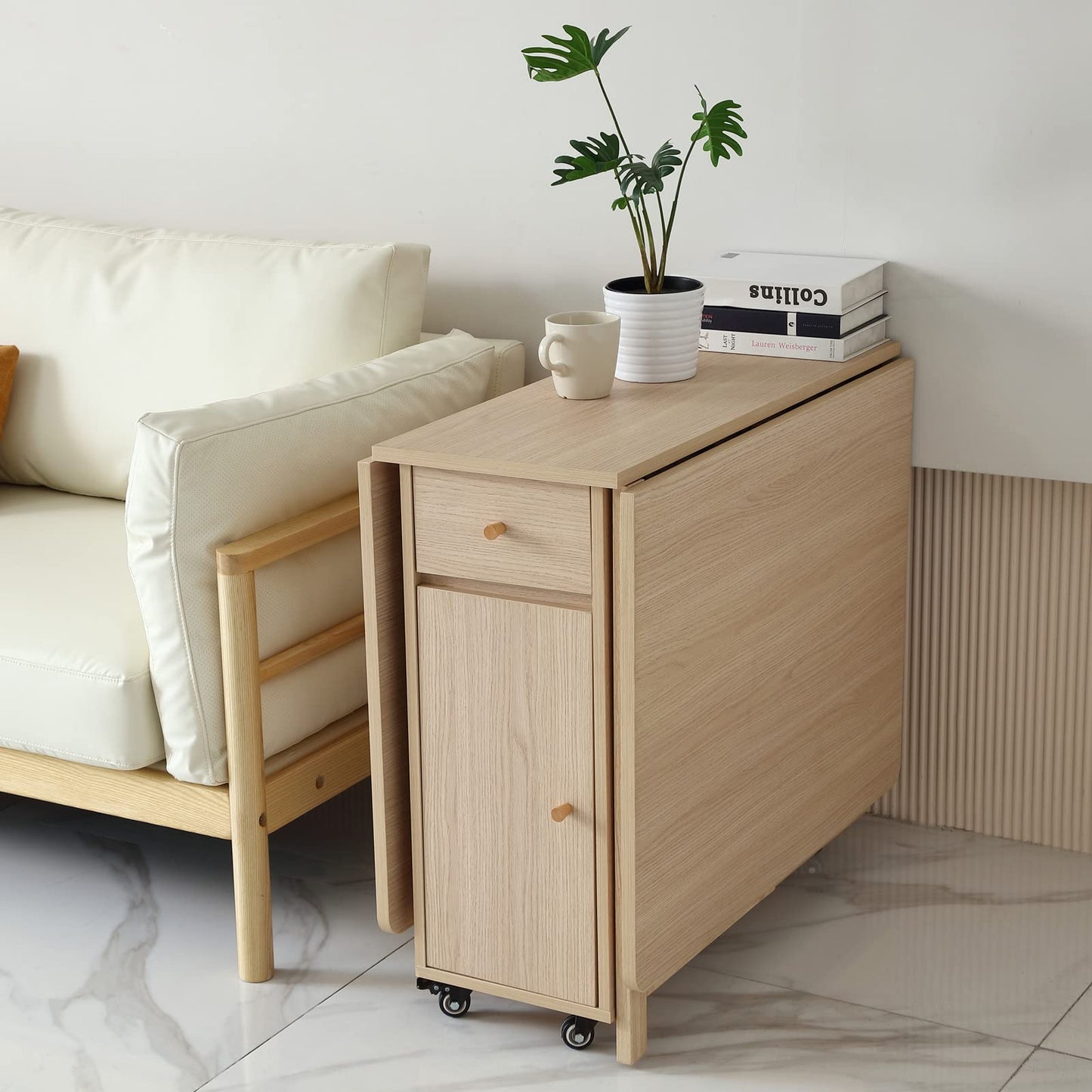 COMUHOME folding dining table, drop leaf, drawers, wheels, wood color finish.