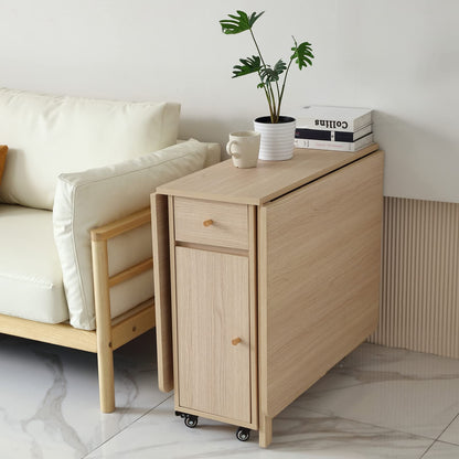 COMUHOME folding dining table, drop leaf, drawers, wheels, wood color finish.